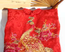 Ladies vintage cheongsam with peacock embroidery