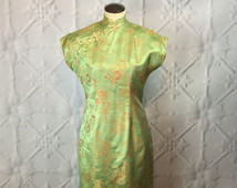 Vintage 1960's Iridescent Green Silk Cheongsam Evening Dress / Long Qipao with Spring Scene of Pagoda and Plum Blossoms