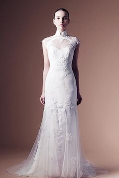 Y este vestido Annasul con cuello cheongsam es elegante y con clase. | 35 vestidos de novia que a toda novia obsesionada con Disney le encantará