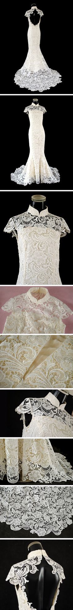 Oh, holy crap. This is the best of both my worlds.  Beautiful Mandarin collar, white lace... gorgeous.