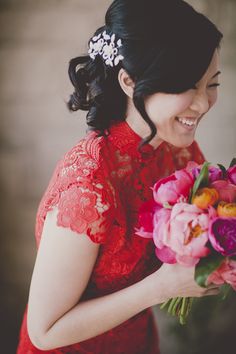 Chinese tea ceremony with red dress Read More: http://www.stylemepretty.com/canada-weddings/2014/04/07/modern-pink-malaparte-wedding-with-balloons/