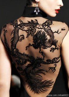 Qipao. The detailed mesh backing is gorgeously sexy.