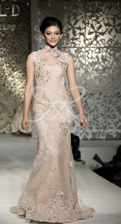 Soft cream cheongsam gown collection by Rusly Tjohnardi Atelier